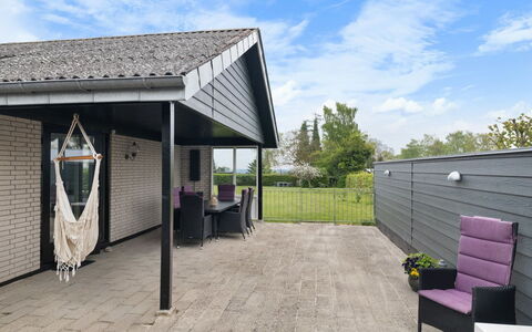 Andine - 250M from the Sea: Home, Roof, Shade, Siding, Garden, Cottage, Yard, Patio, Landscaping, Estate
