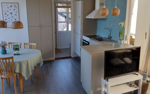 Kaare - 250M from the Sea: Furniture, Interior Design, Flooring, Floor, Wood, Kitchen, Room, Chair, Ceiling, Countertop