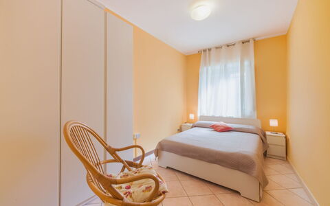 Appartamento Brezza Marina: Interior Design, Furniture, Floor, Flooring, Bed, Bedroom, Wood, Room, Ceiling, Bed Sheet