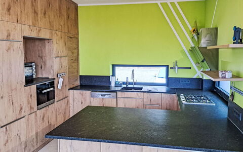 Villa Techelsberg: Flooring, Wood, Interior Design, Floor, Countertop, Kitchen, Furniture, Ceiling, Cabinetry, Room