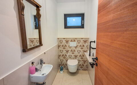 Villa Techelsberg: Bathroom, Plumbing Fixture, Flooring, Toilet Seat, Floor, Bathroom Sink, Toilet, Tap, Interior Design, Plumbing
