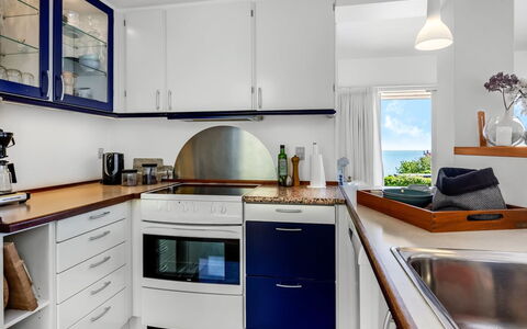 Tobias - 45M to the Fjord: Kitchen, Interior Design, Flooring, Kitchen Appliance, Countertop, Furniture, Wood, Cabinetry, Major Appliance, Floor