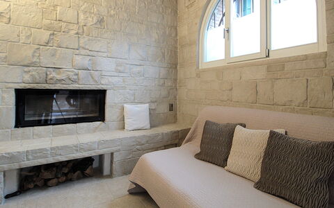 Design Loft, Romantic Retreat, Feltre: Wall, Flooring, Interior Design, Floor, Stone Wall, Furniture, Couch, Ceiling, Living Room, Room