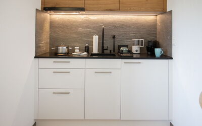 La Siala Apt.64 100.8: Kitchen, Countertop, Interior Design, Kitchen Appliance, Wood, Cabinetry, Furniture, Flooring, Lighting, Home