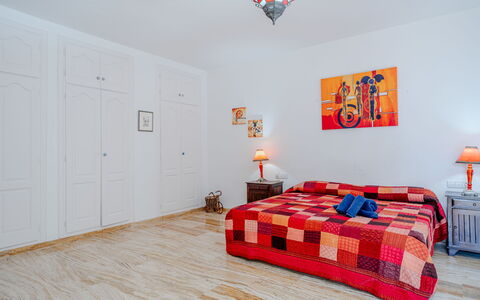 Casela: Furniture, Interior Design, Flooring, Floor, Wall, Wood, Bedroom, Room, Bed, Ceiling
