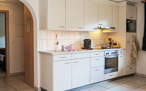 Haus Europa: Kitchen, Countertop, Kitchen Appliance, Major Appliance, Cabinetry, Furniture, Interior Design, Flooring, Kitchen Sink, Floor