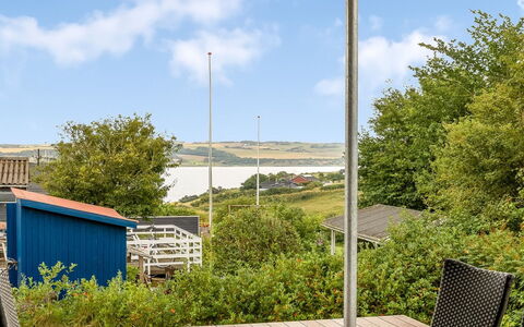 Stjerne - 300M to the Fjord: Land Lot, Deck, Porch, Outdoor Furniture, Shade, Coast, Outdoor Structure, Hardwood, Chair, Wood Stain
