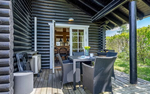 Edzard - 900M from the Sea: Wood, Furniture, Chair, Cottage, Hardwood, Porch, Outdoor Furniture, Deck, Plank, Shade