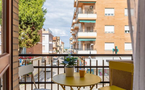 Casa Ballerini: Apartment, Balcony, Urban Design, Condominium, Mixed-Use, Porch, Chair, Handrail, Wood Stain, Houseplant