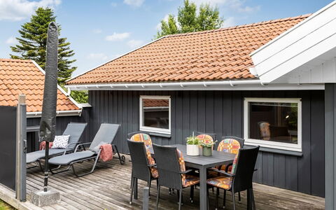 Irlin - 850M from the Sea: Wood, Roof, House, Home, Siding, Cottage, Porch, Shade, Outdoor Furniture, Hardwood