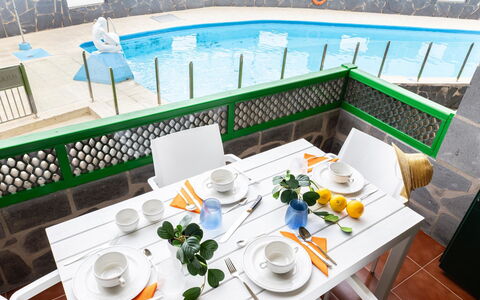 Aquarius 18: Outdoor Furniture, Home, Furniture, Door, Outdoor Table, Chair, Kitchen & Dining Room Table, Shade, Balcony, Porch