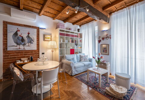 Dafne Suite: Furniture, Interior Design, Wall, Flooring, Floor, Table, Ceiling, Room, Couch, Living Room