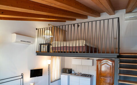 Roof: Interior Design, Furniture, Flooring, Floor, Room, Bed, Ceiling, Bedroom, Wood Stain, Hardwood