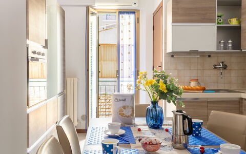 Suite Acquamare: Furniture, Interior Design, Kitchen, Kitchen Appliance, Wood, Flooring, Tableware, Major Appliance, Chair, Table