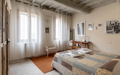 San Cristofano Blu Apartment Santa Croce, Florence: Wall, Interior Design, Flooring, Floor, Bedroom, Furniture, Ceiling, Room, Bed, Apartment