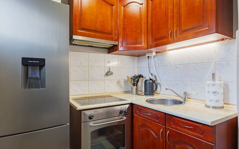 Nest: Kitchen Appliance, Kitchen, Major Appliance, Cabinetry, Countertop, Home Appliance, Flooring, Refrigerator, Interior Design, Small Appliance