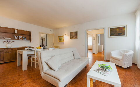 Lido Versilia: Furniture, Interior Design, Flooring, Couch, Floor, Room, Apartment, Living Room, Table, Home