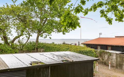 Gabriele - 50M from the Sea: Roof, House, Home, Cottage, Siding, Estate, Driveway, Garden Buildings, Yard, Shed