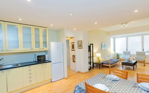 Eixample Dret Corsega Roger Lluria: Building, Furniture, Cabinetry, Chair, Window, Countertop, Wood, Floor, Flooring, Houseplant