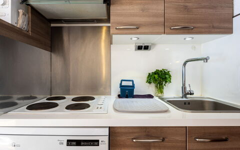 Grand Morillon: Countertop, Kitchen Appliance, Kitchen, Plumbing Fixture, Major Appliance, Interior Design, Sink, Kitchen Sink, Cabinetry, Tap