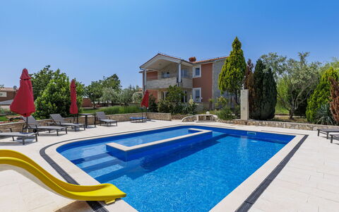 Villa Majmajola: Shrub, Garden, Shade, Lawn, Outdoor Furniture, Backyard, Landscaping, Yard, Estate, Chair