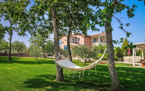 Villa Majmajola: Shrub, Garden, Shade, Lawn, Outdoor Furniture, Backyard, Landscaping, Yard, Estate, Chair