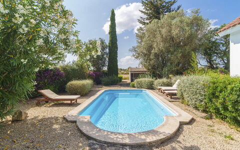 Es Camp Jeu: Blue, Swimming Pool, Garden, Landscaping, Estate, Backyard, Water Feature, Farmhouse, Villa