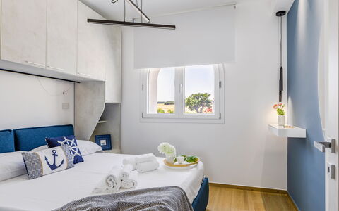 Brezza Costa Conero: Furniture, Bed, Bedroom, Interior Design, Bed Sheet, Bedding, Linens, Textile, Room, Floor
