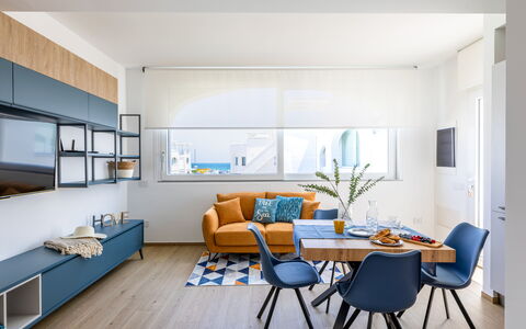 Brezza Costa Conero: Furniture, Interior Design, Couch, Flooring, Floor, Living Room, Wood, Room, Table, Ceiling