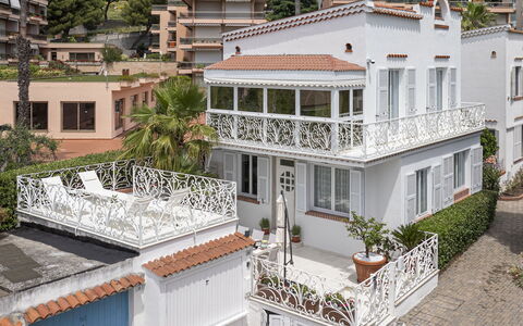 Villa Solaris: Window, Residential Area, Home, House, Facade, Neighbourhood, Shrub, Balcony, Human Settlement, Apartment