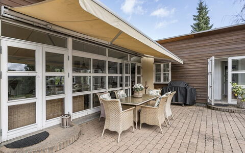 Mads - 1.2Km from the Sea: Wood, Furniture, Roof, Shade, Home, Outdoor Furniture, Chair, Door, Awning, Porch