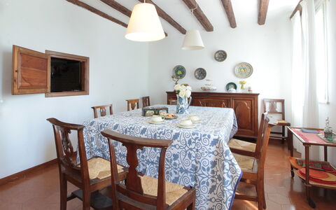 Casa Ballo delle Streghe, Garden, Montebelluna: Furniture, Interior Design, Wood, Dining Room, Table, Flooring, Kitchen & Dining Room Table, Chair, Room, Lighting