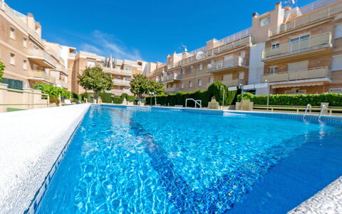 Aires de Mar: Water, Building, Sky, Plant, Property, Swimming Pool, Azure, Window, Blue, House