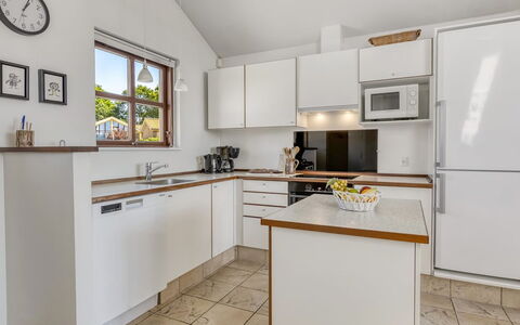 Era - 100M from the Sea: Countertop, Kitchen, Furniture, Interior Design, Kitchen Appliance, Cabinetry, Flooring, Major Appliance, Wood, Ceiling