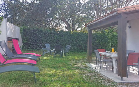 L'Escale: Furniture, Outdoor Furniture, Garden, Lawn, Chair, Backyard, Outdoor Table, Yard, Shade, Landscaping