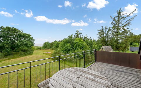 Gadde - 100M to the Fjord: Sky, Grassland, Land Lot, Plain, Cloud, Handrail, Deck, Hardwood, Fence, Garden