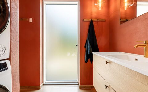 Vilppu - 900M from the Sea: Flooring, Interior Design, Floor, Orange, Brown, Plumbing Fixture, Bathroom Cabinet, Mirror, Room, Bathroom