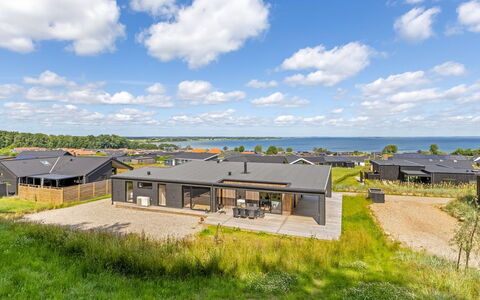 Heidie - 600M from the Sea: Roof, House, Home, Cottage, Siding, Estate, Driveway, Garden Buildings, Yard, Shed