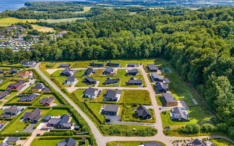 Heidie - 600M from the Sea: Roof, House, Home, Cottage, Siding, Estate, Driveway, Garden Buildings, Yard, Shed
