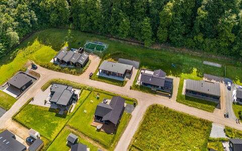 Heidie - 600M from the Sea: Roof, House, Home, Cottage, Siding, Estate, Driveway, Garden Buildings, Yard, Shed