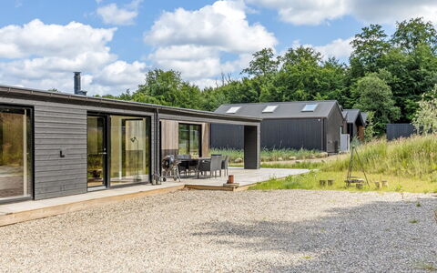 Heidie - 600M from the Sea: Roof, House, Home, Cottage, Siding, Estate, Driveway, Garden Buildings, Yard, Shed