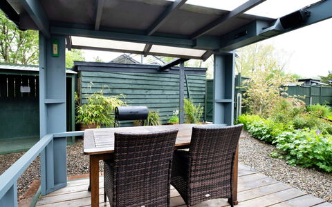 The Grove Annexe: Furniture, Outdoor Furniture, Table, Chair, Shade, Outdoor Table, Porch, Garden, Outdoor Structure, Backyard