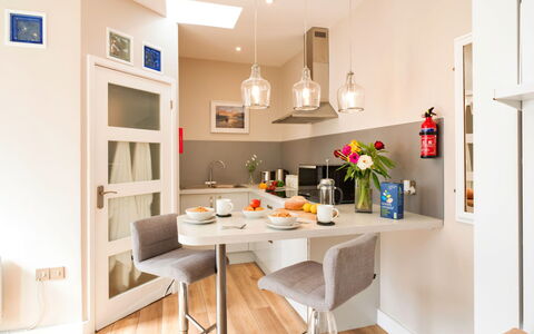 The Hideaway: Furniture, Interior Design, Flooring, Wall, Chair, Kitchen, Floor, Wood, Countertop, Light Fixture