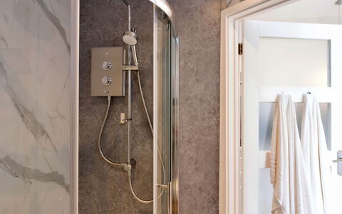 The Hideaway: Plumbing Fixture, Interior Design, Bathroom, Flooring, Floor, Plumbing, Lighting, Shower Head, Shower, Room
