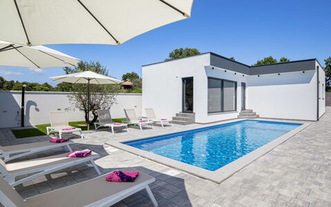 L&L: Swimming Pool, Composite Material, Resort, Concrete, Tile, Design, Outdoor Furniture, Estate, Villa, Shade
