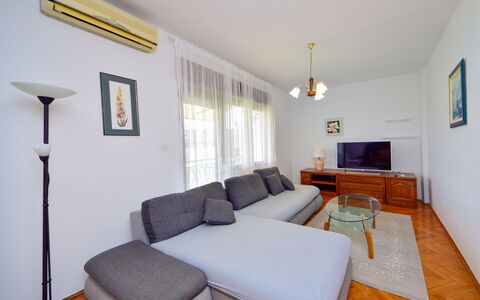 Pantan: Furniture, Couch, Flooring, Interior Design, Floor, Wood, Living Room, Room, Ceiling, Wood Flooring