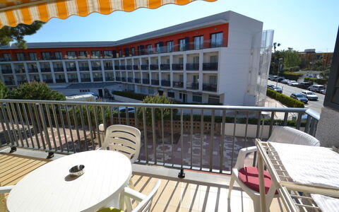 Cambrils 185: Sky, Property, Furniture, Table, Plant, Architecture, Building, Chair, Outdoor Furniture, Shade