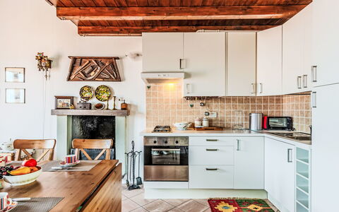 Laghina: Kitchen Appliance, Kitchen, Countertop, Furniture, Interior Design, Cabinetry, Major Appliance, Flooring, Home Appliance, Kitchen Stove