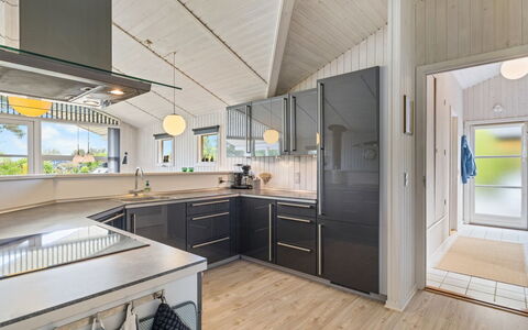Frederikke - 875M from the Sea: Wood, Ceiling, Interior Design, Flooring, Wood Flooring, Kitchen, Floor, Light Fixture, Countertop, Home