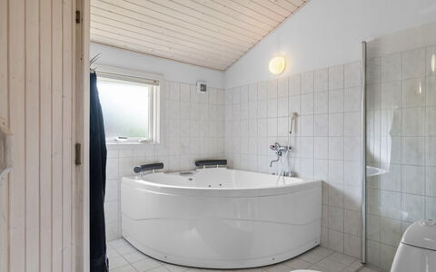 Frederikke - 875M from the Sea: Flooring, Plumbing Fixture, Floor, Interior Design, Ceiling, Bathroom, Bathtub, Plumbing, Tap, Composite Material